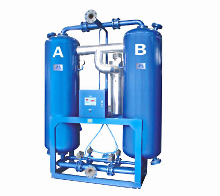 Heated regenerative desiccant compressed air dryer