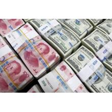 China Lets Yuan Tumble Past 7 Per Dollar as Trade War Escalates
