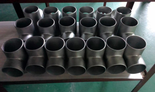 Titanium pipe fittings