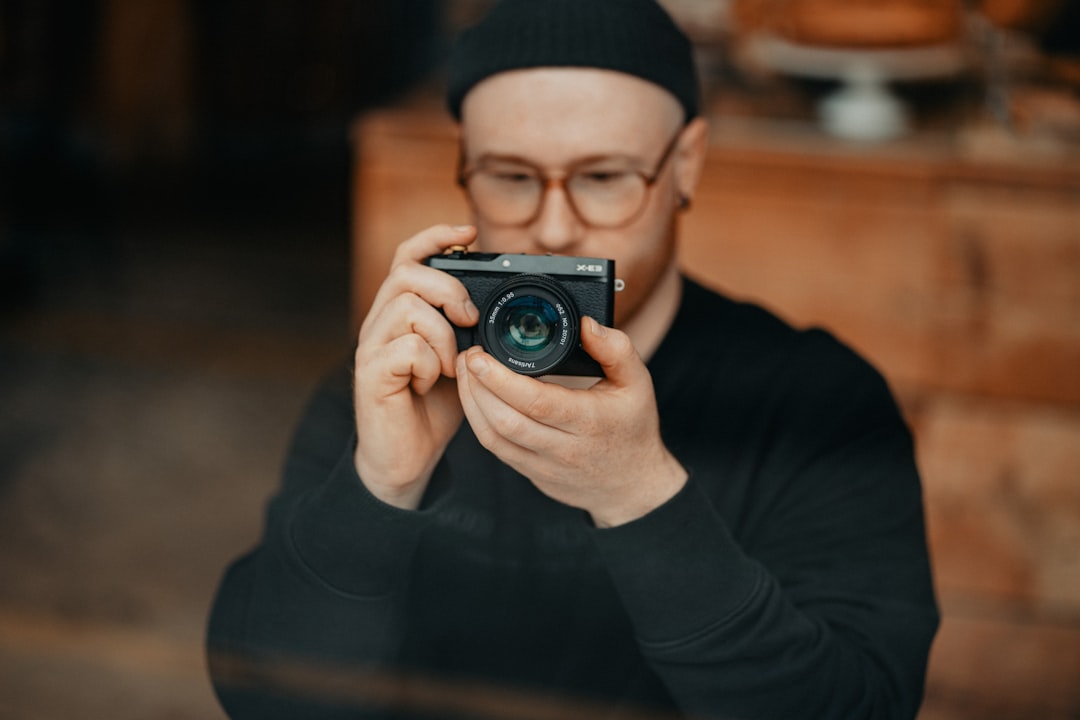 Person trying on retro optical frames