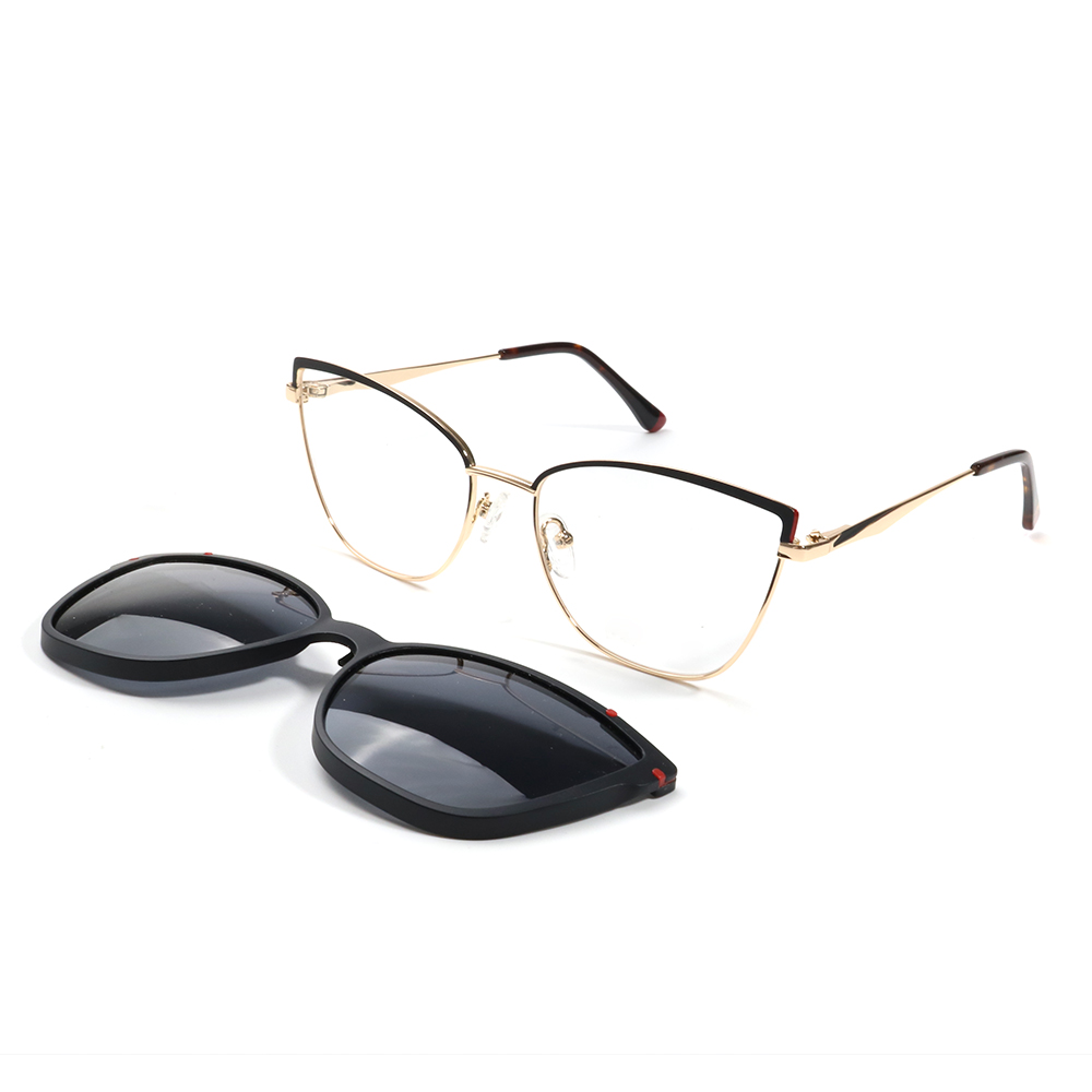 Gold metal eyeglass frame with grey clip on sunglasses