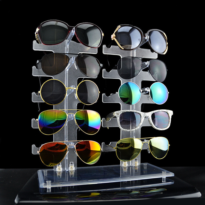 eyeglasses frame riser display stand five-tier stepped three-quarter view in clear, with optional printed logo