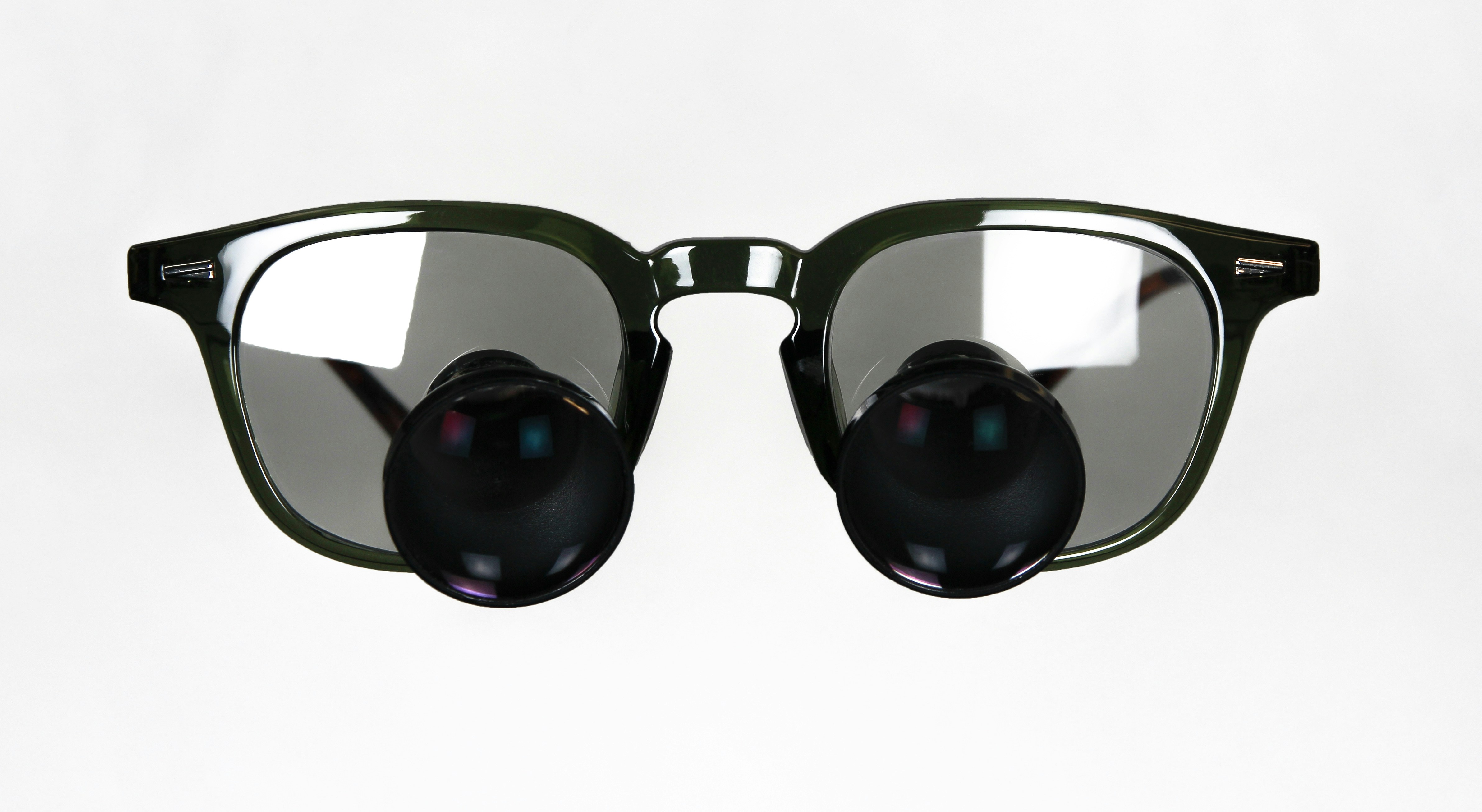 A collection of premium men's optical frames in acetate and titanium