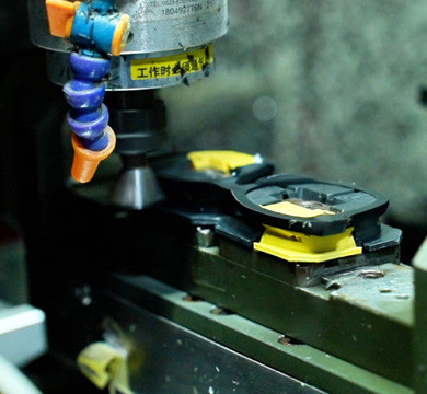 CNC machining of an acetate sunglass front in production