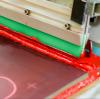 The factors that determine the amount of ink applied in screen printing