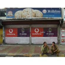 Vodafone merges Indian business to win customers