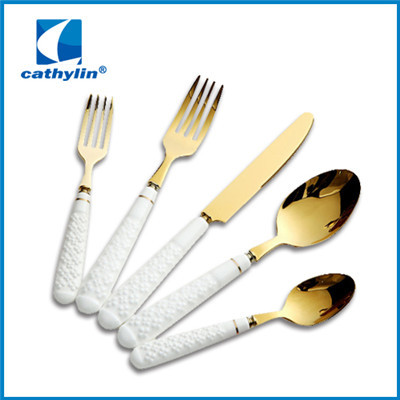Ceramic handle golden flatware set