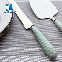 Stainless steel cake knife with ceramic handle
