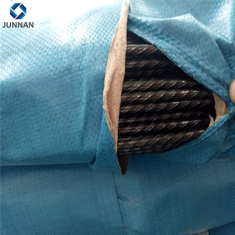 PC steel strand coil showing 82B grade reference in production workshop