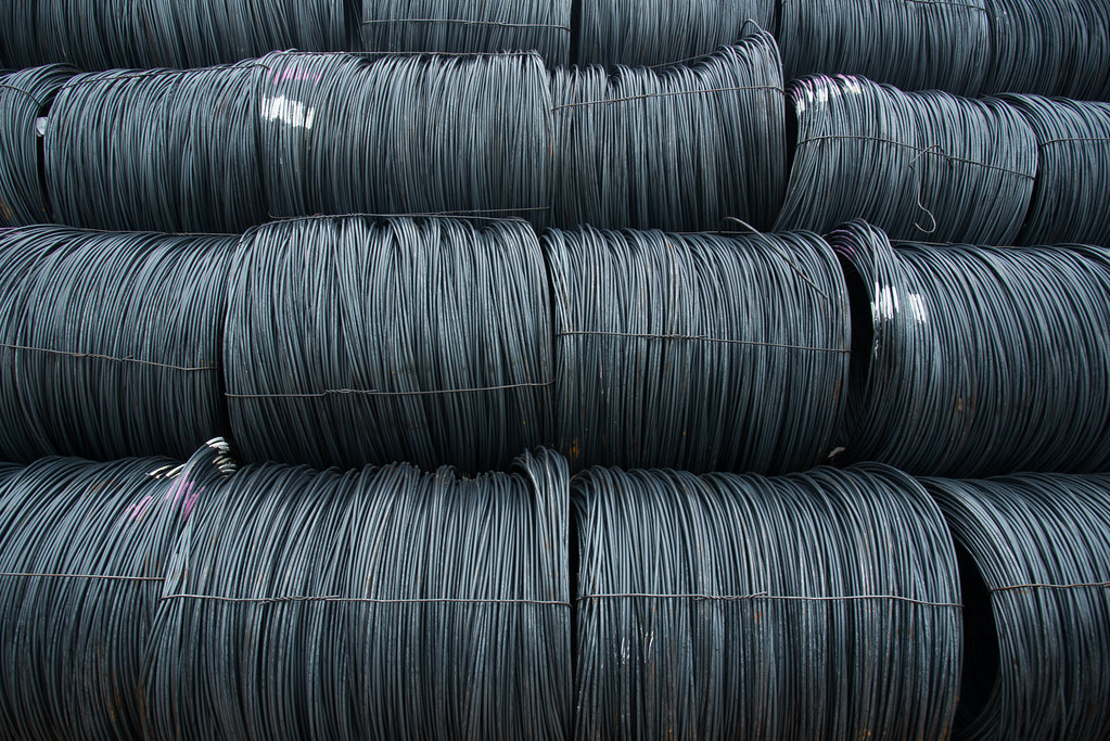 Wire rod coils in a steel storage yard awaiting inspection
