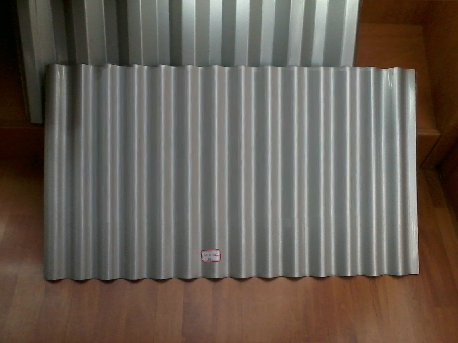 Corrugated steel roofing sheet
