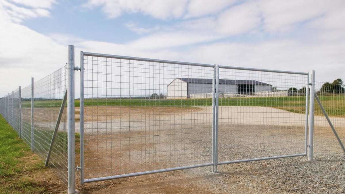 Galvanized welded wire mesh fencing installed around an industrial site