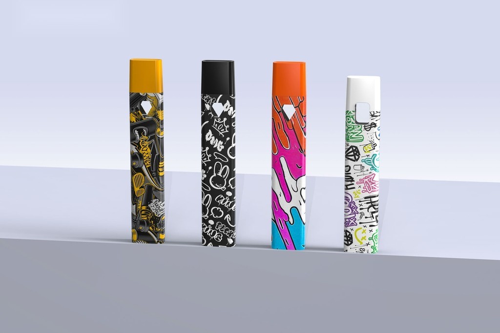 Custom branded CannaMate disposable vapes with unique artwork demonstrating brand protection and anti-counterfeiting