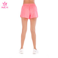 Hucai Training Clothing Loose Fit Mesh Insert Dry Fit Women Wholesale Running Shorts