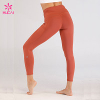 Wholesale 86%Nylon 14%Spandex Fitness Wear With Pockets Women Terracotta Leggings Manufacturer