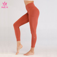 Wholesale 86%Nylon 14%Spandex Fitness Wear With Pockets Women Terracotta Leggings Manufacturer