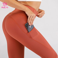 Wholesale 86%Nylon 14%Spandex Fitness Wear With Pockets Women Terracotta Leggings Manufacturer