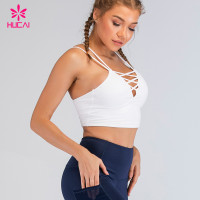 China Wholesale Sportswear Sexy Running Yoga Tops Custom Logo Strappy Sport Bra