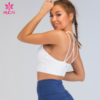 China Wholesale Sportswear Sexy Running Yoga Tops Custom Logo Strappy Sport Bra