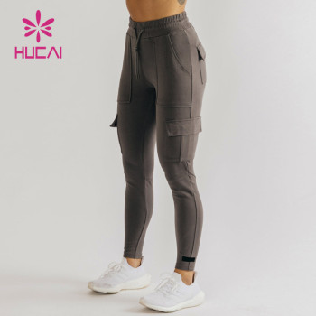 HUCAI High Quality Plain Color Pants With Pockets Women Sports Yoga Leggings Supplier