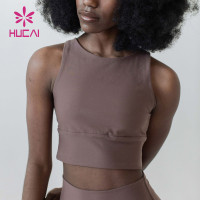 Hucai Fashion Back Hollow Design Crop Top Plain Color Sports Bras China Clothes Factory