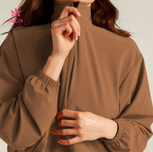 HUCAI Custom Woven Half Zip Pullover with Front Kangaroo Pocket and Elastic Waist Supplier