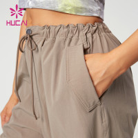 HUCAI OEM Sports Joggers Drawstring Design Light Quick-drying Fabric Gym Pants Supplier