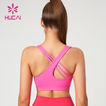 HUCAI Fashionable Asymmetric Straps Design Yoga Bras with Excellent Support Performance Suppiler