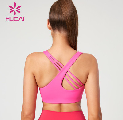HUCAI Fashionable Asymmetric Straps Design Yoga Bras with Excellent Support Performance Suppiler