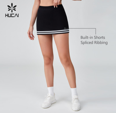 HUCAI OEM Classic College Style Black And White Spliced Tennis Short Skirt Sportswear Manufacturer