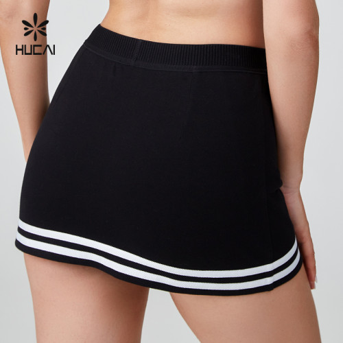 HUCAI OEM Classic College Style Black And White Spliced Tennis Short Skirt Sportswear Manufacturer