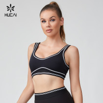 HUCAI Sportswear Manufacturer|OEM Scooped Neck Streamlined Contrasting Stitching Sports Bra