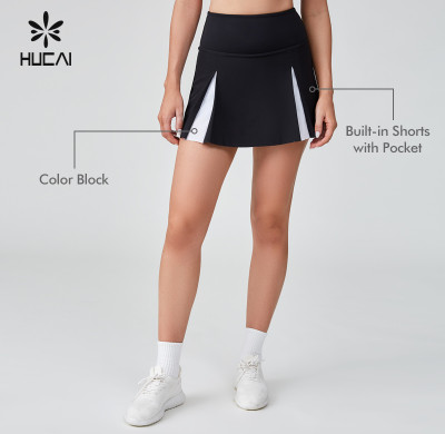 HUCAI Sportswear Manufacturer|Custom Polyester Spandex Black And White Patchwork Tennis Skirt