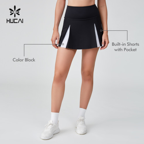 HUCAI Sportswear Manufacturer|Custom Polyester Spandex Black And White Patchwork Tennis Skirt