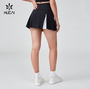 HUCAI Sportswear Manufacturer|Custom Polyester Spandex Black And White Patchwork Tennis Skirt