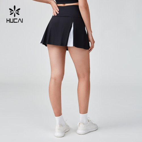 HUCAI Sportswear Manufacturer|Custom Polyester Spandex Black And White Patchwork Tennis Skirt