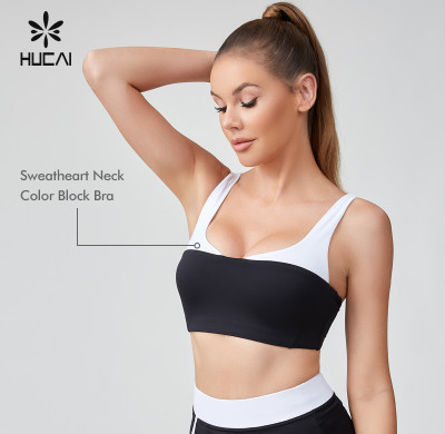 HUCAI Sportswear Manufacturer|Custom Streamlined Chest Cup Splicing Black Wrapped Yoga Bra