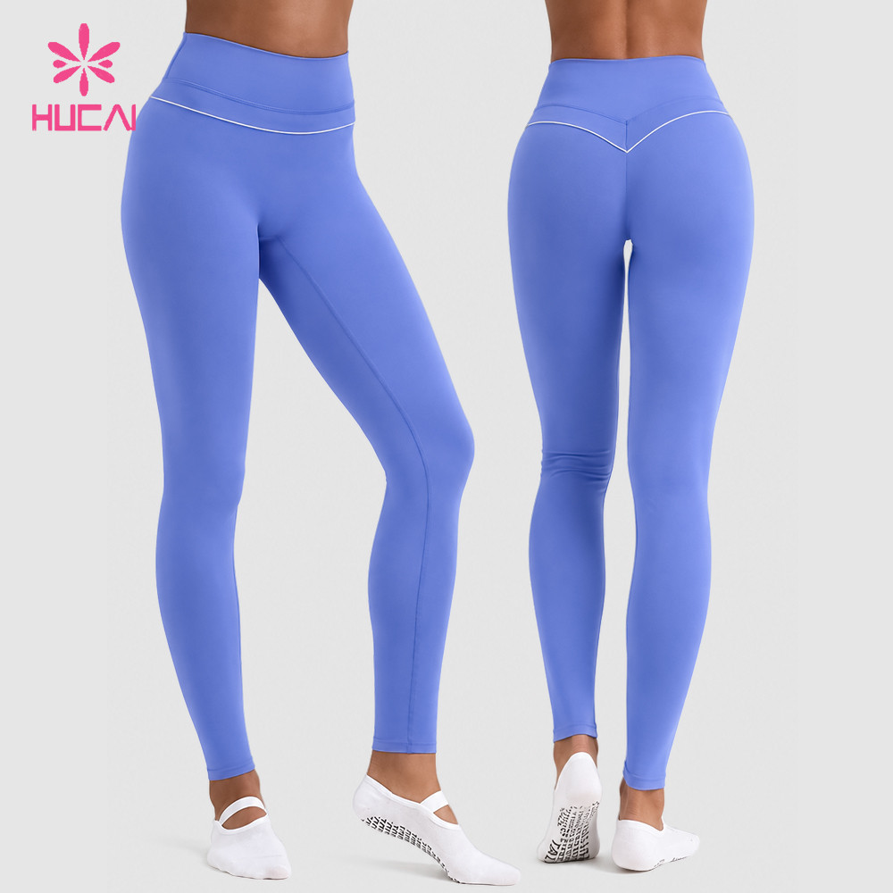 Custom iris blue leggings front and back views with contrast piping and V-shaped back seam