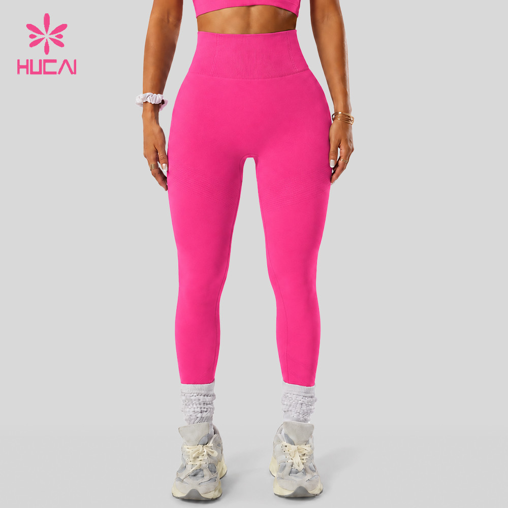 Model in pale high-waist women's leggings viewed from behind in a studio setting, showing an even matte knit surface at the seat and thigh