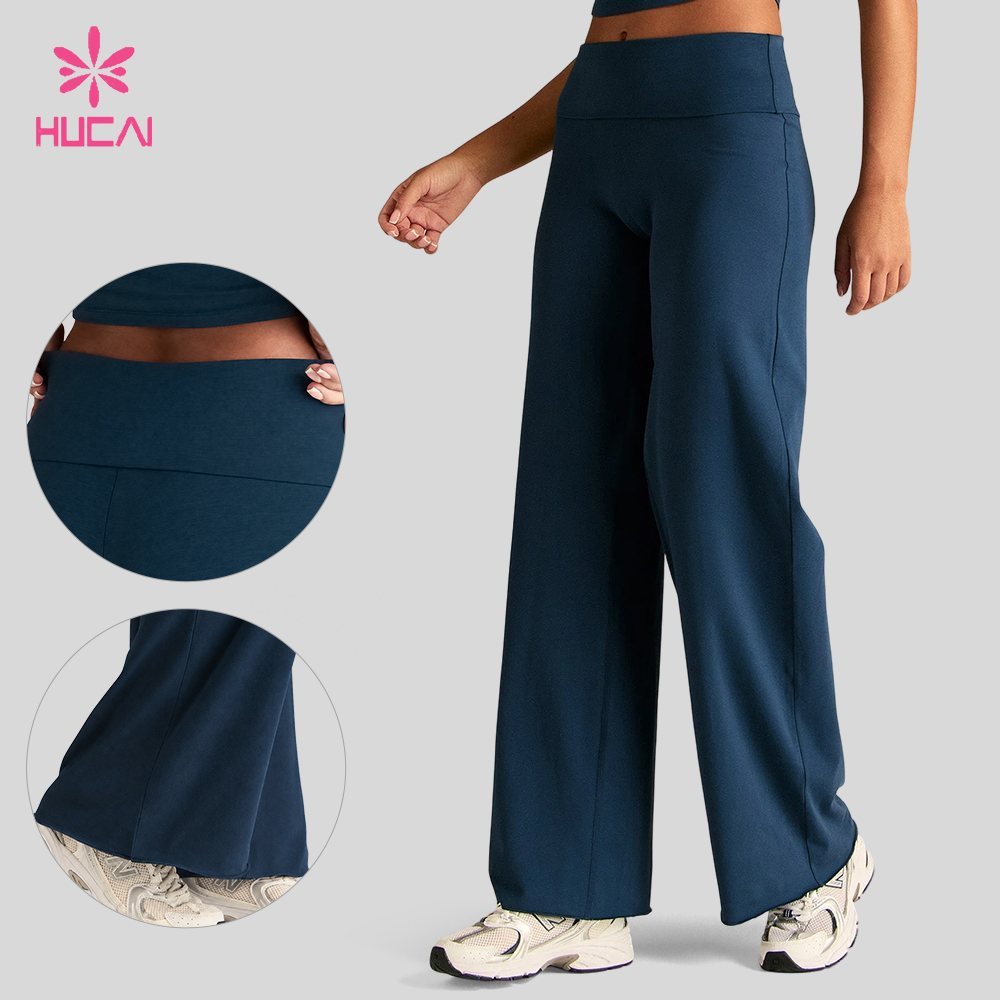 Custom wide leg leggings side view with fold-over waistband and hem detail insets