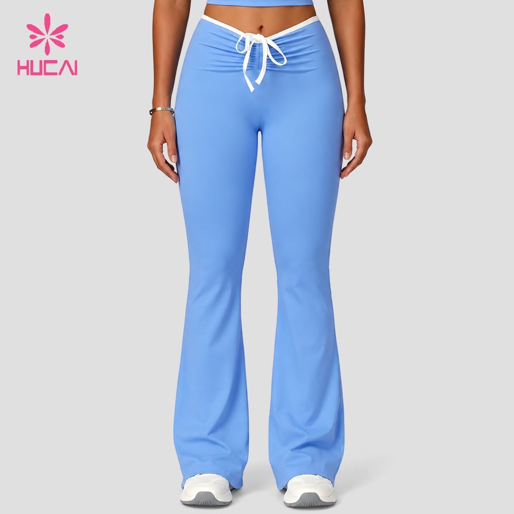 Custom blue low rise flare leggings full front view with contrast drawstring