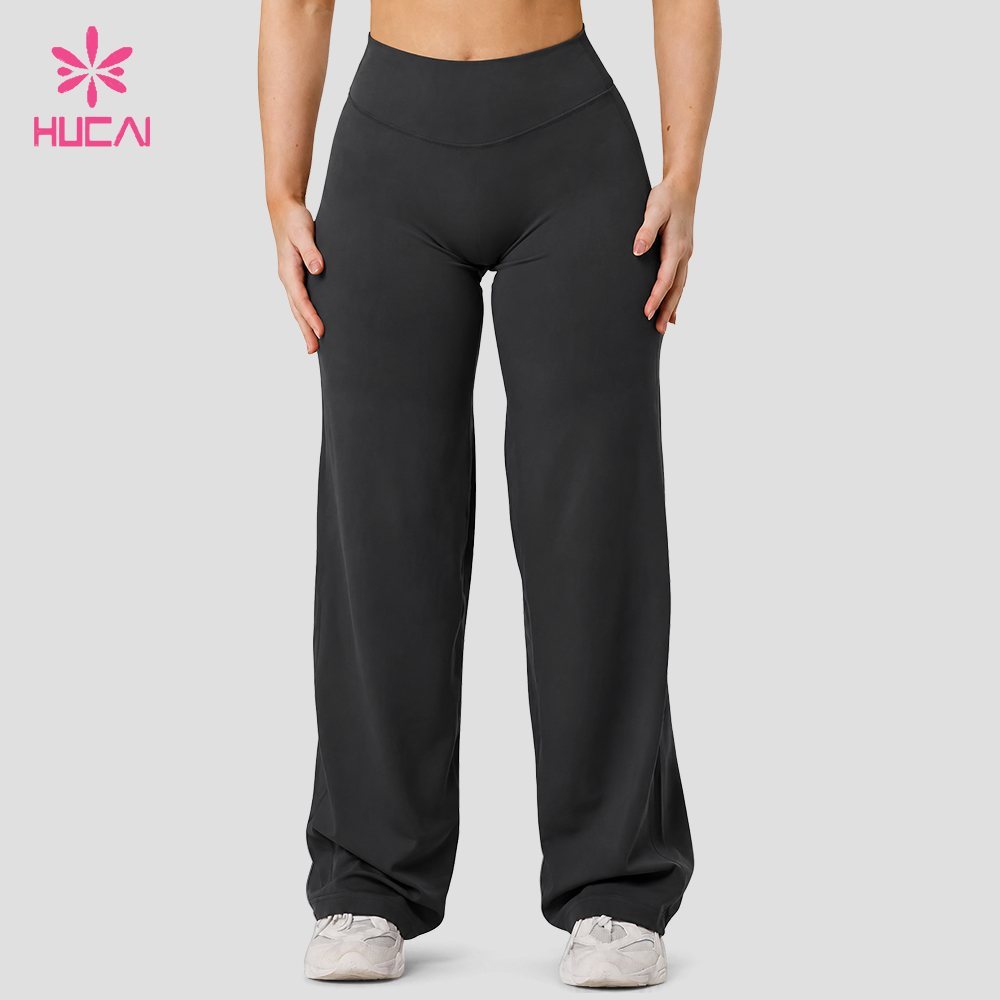 Women's black high-waist wide-leg flowing pants, front view
