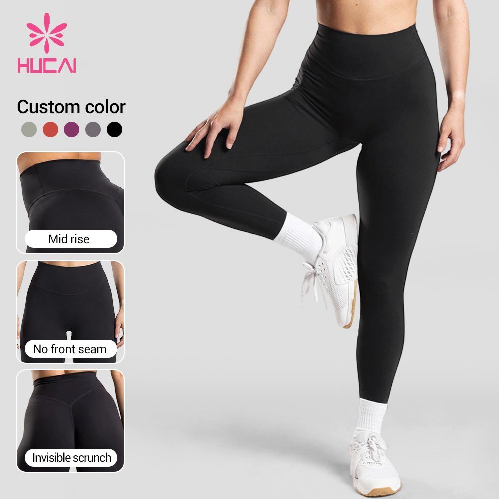 Custom training leggings with the mid rise waistband, smooth front panel and centre-back seam in detail insets