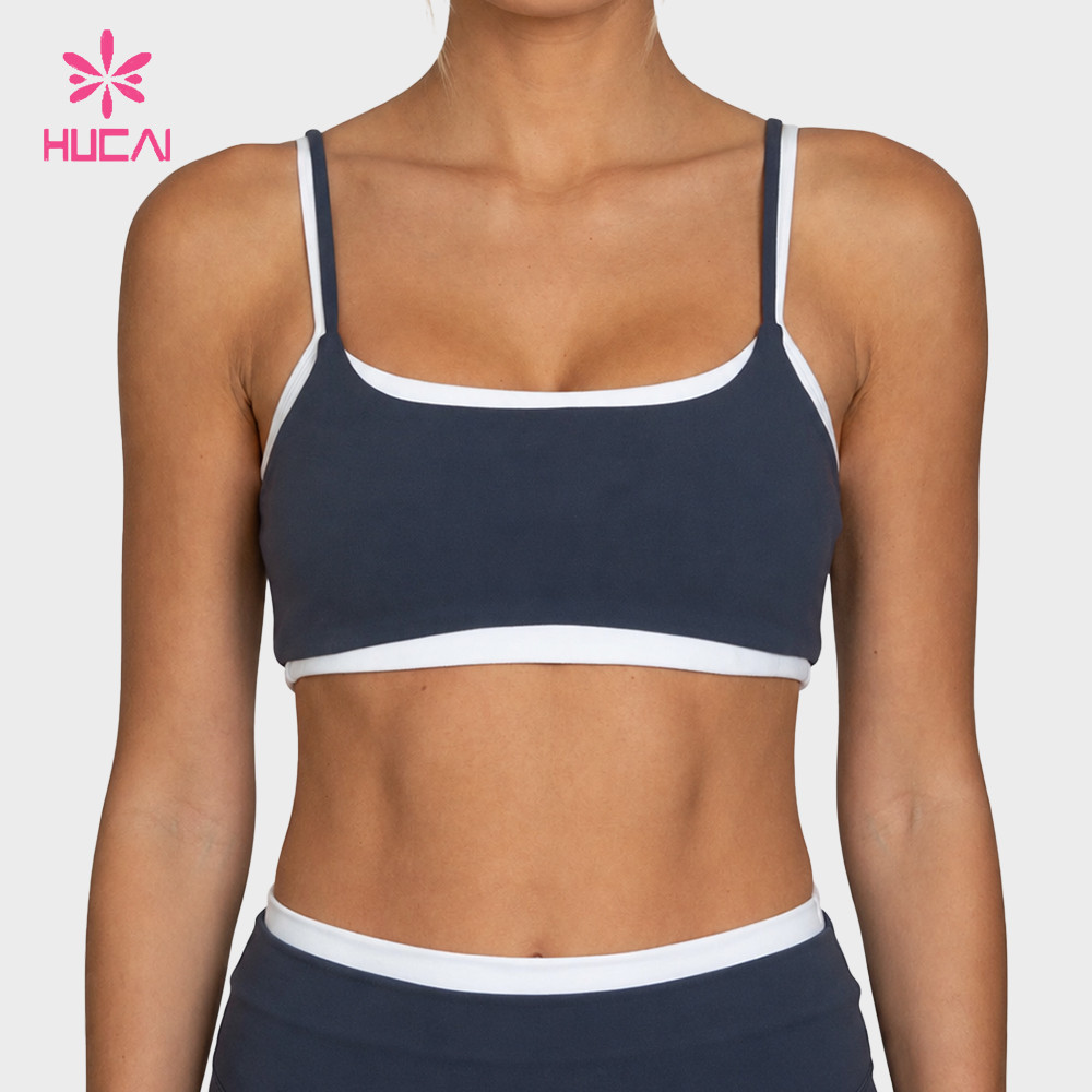 Custom cropped sports bra front view with contrast trim neckline and underband