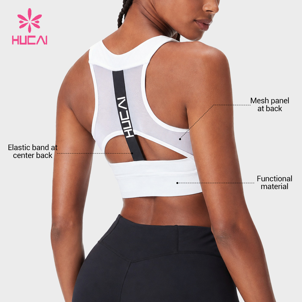 Custom white sports bra side view showing the cut-out side wing and underband