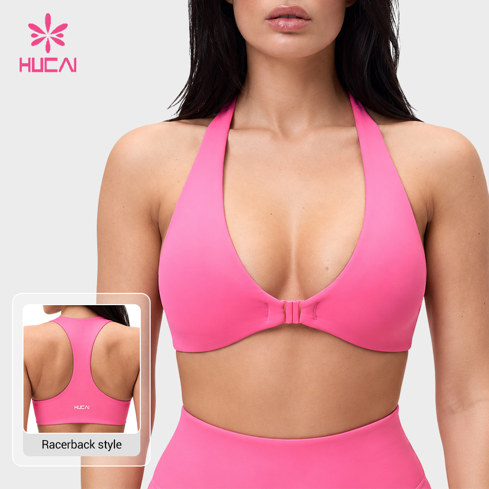 Custom hot pink halter sports bra front view with the front clip closure