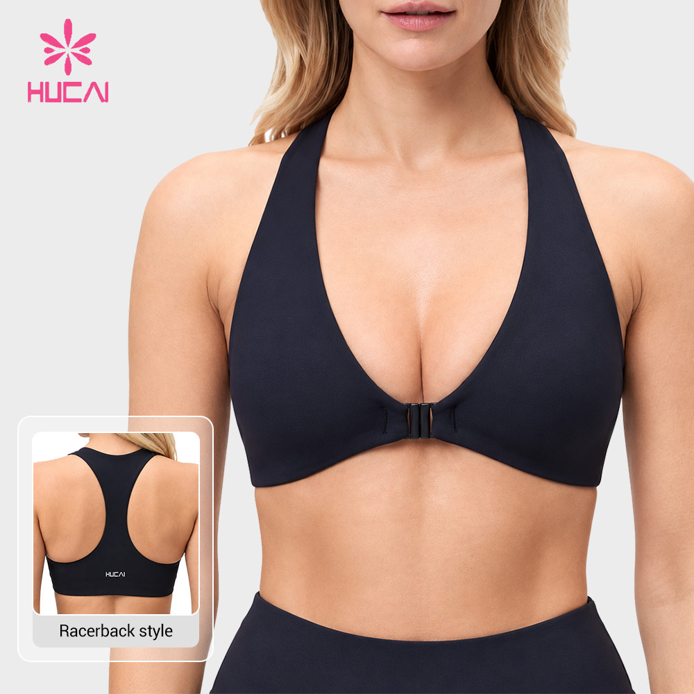 Custom black halter sports bra front view showing the deep V plunge
