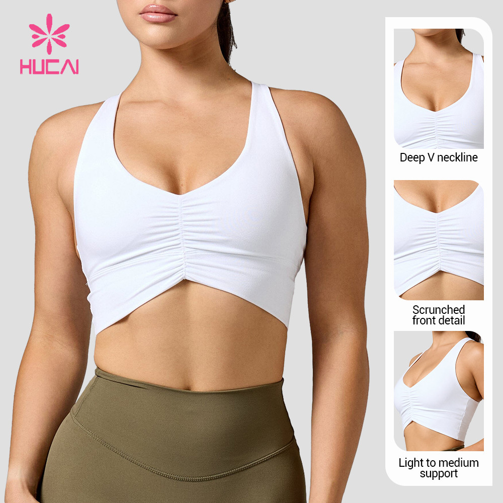 Custom ruched sports bra three-quarter view showing the gather depth