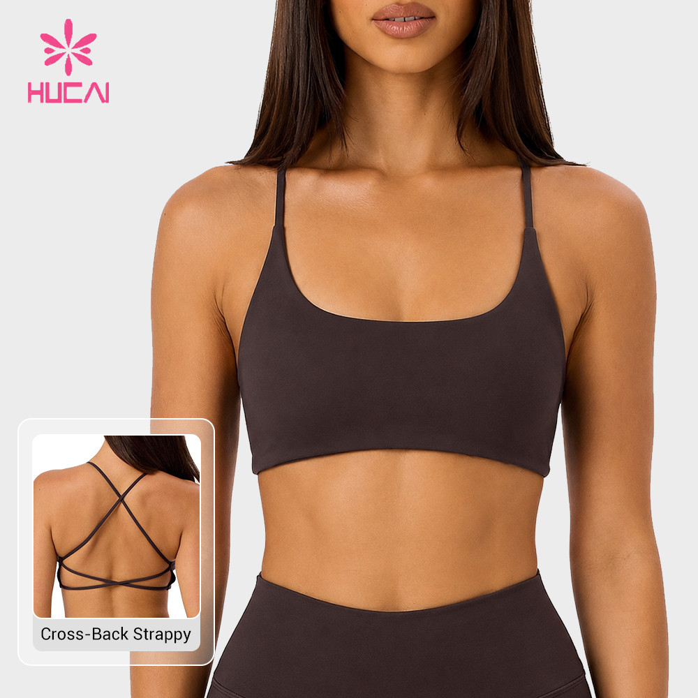 Custom espresso sports bra front view with the multi-strap back shown in the inset