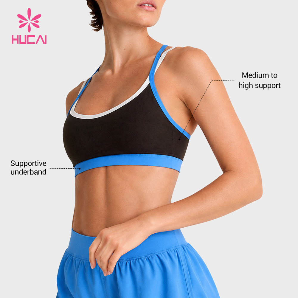 Custom contrast sports bra three-quarter view showing the main and trim strap